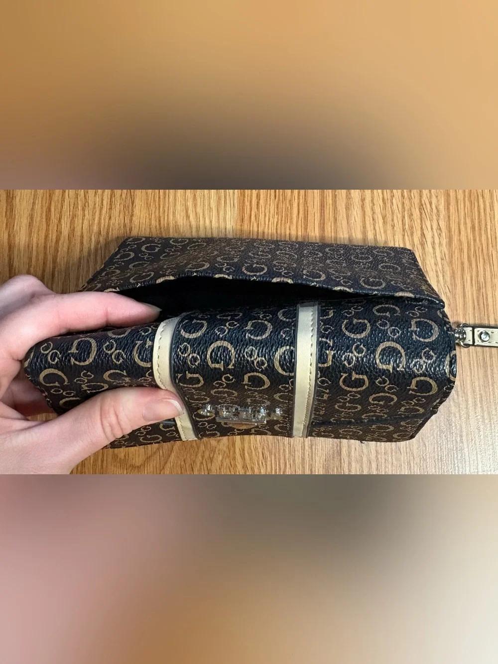 Guess wristlet featuring